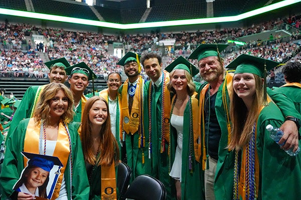 Graduates celebrate in Matthew Knight Arena
