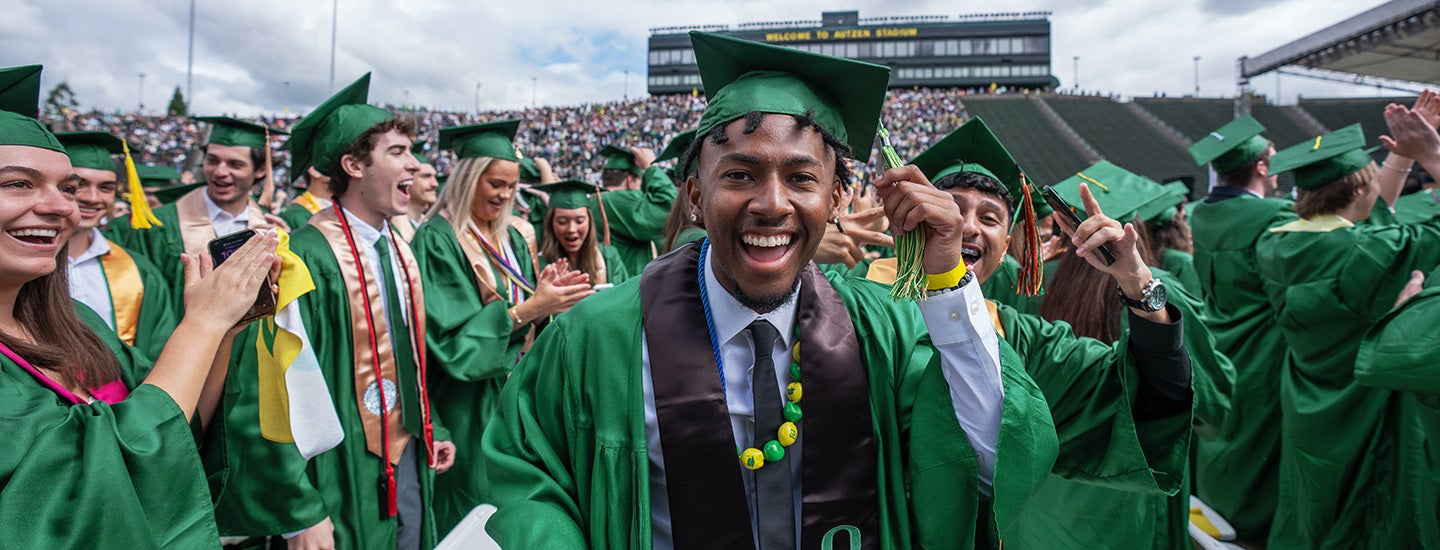 Graduate celebrates after turning his tassle